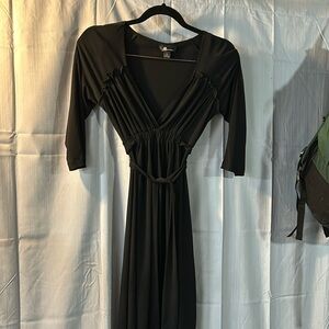 Black silk like material tie back dress.